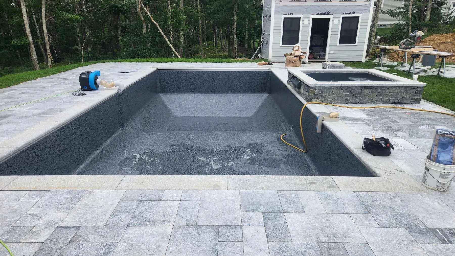 Empty pool shell with new liner, July 15